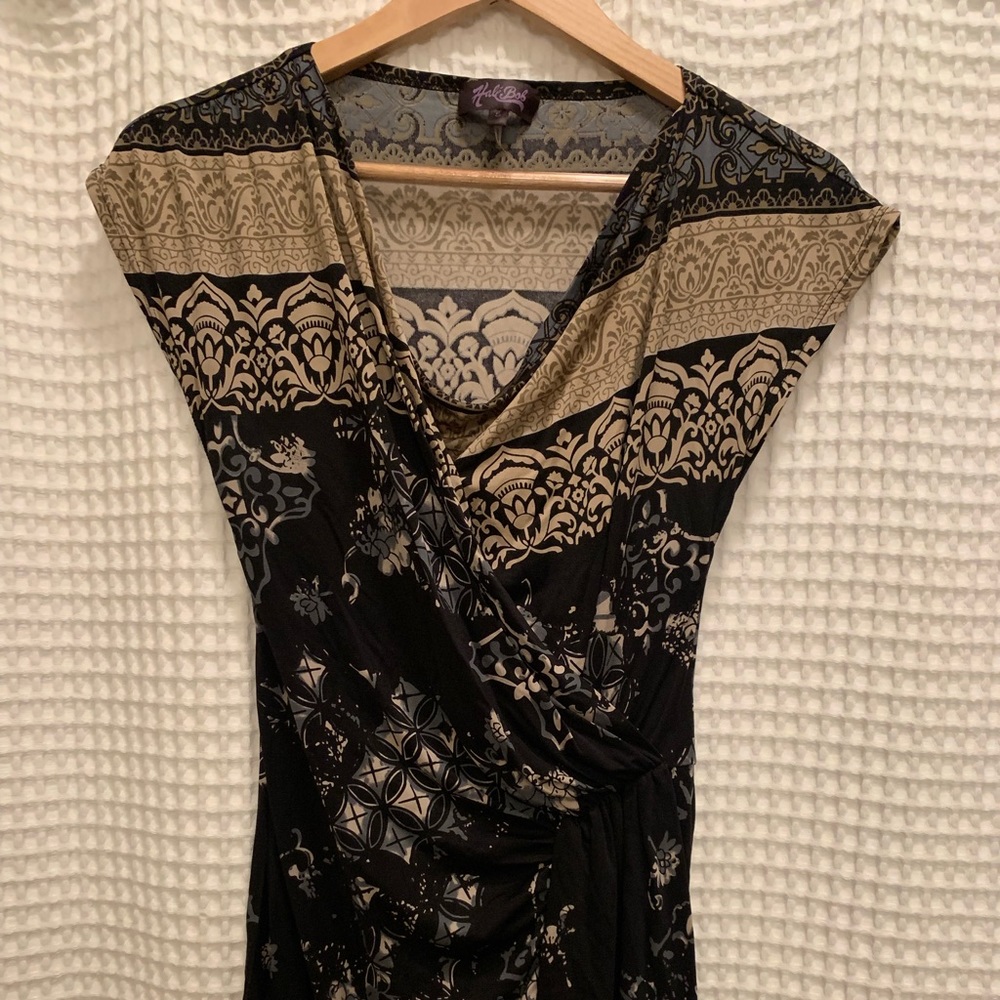 Ladies size small shirt, 100% silk.